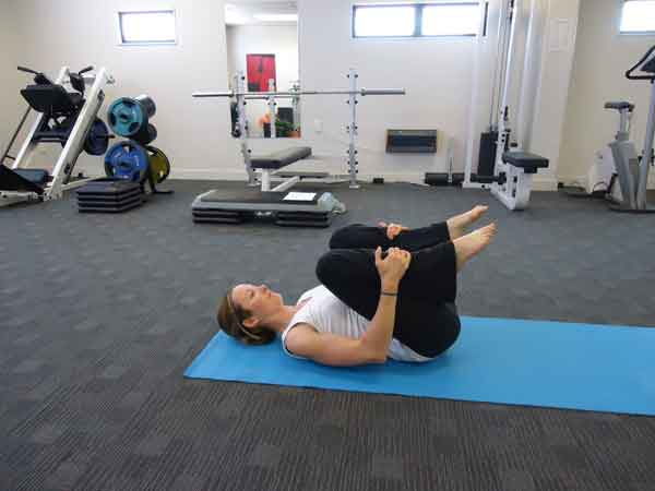Double knee hug