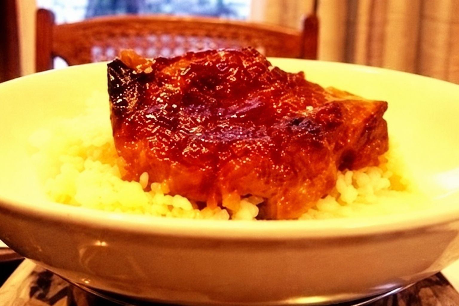 Chili glazed pork chops served over creamy mashed potatoes