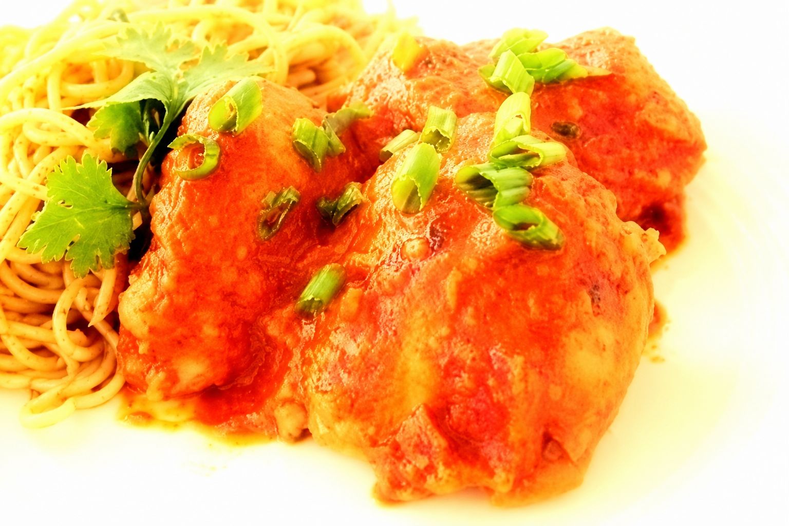 Thai style chicken thighs with peanut cilantro sauce