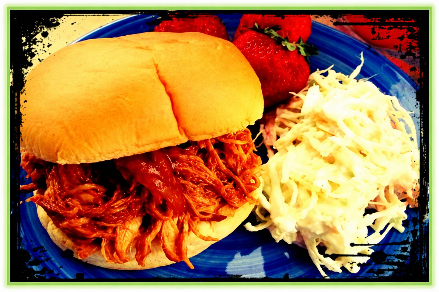 Shredded barbecue chicken piled onto soft sandwich buns