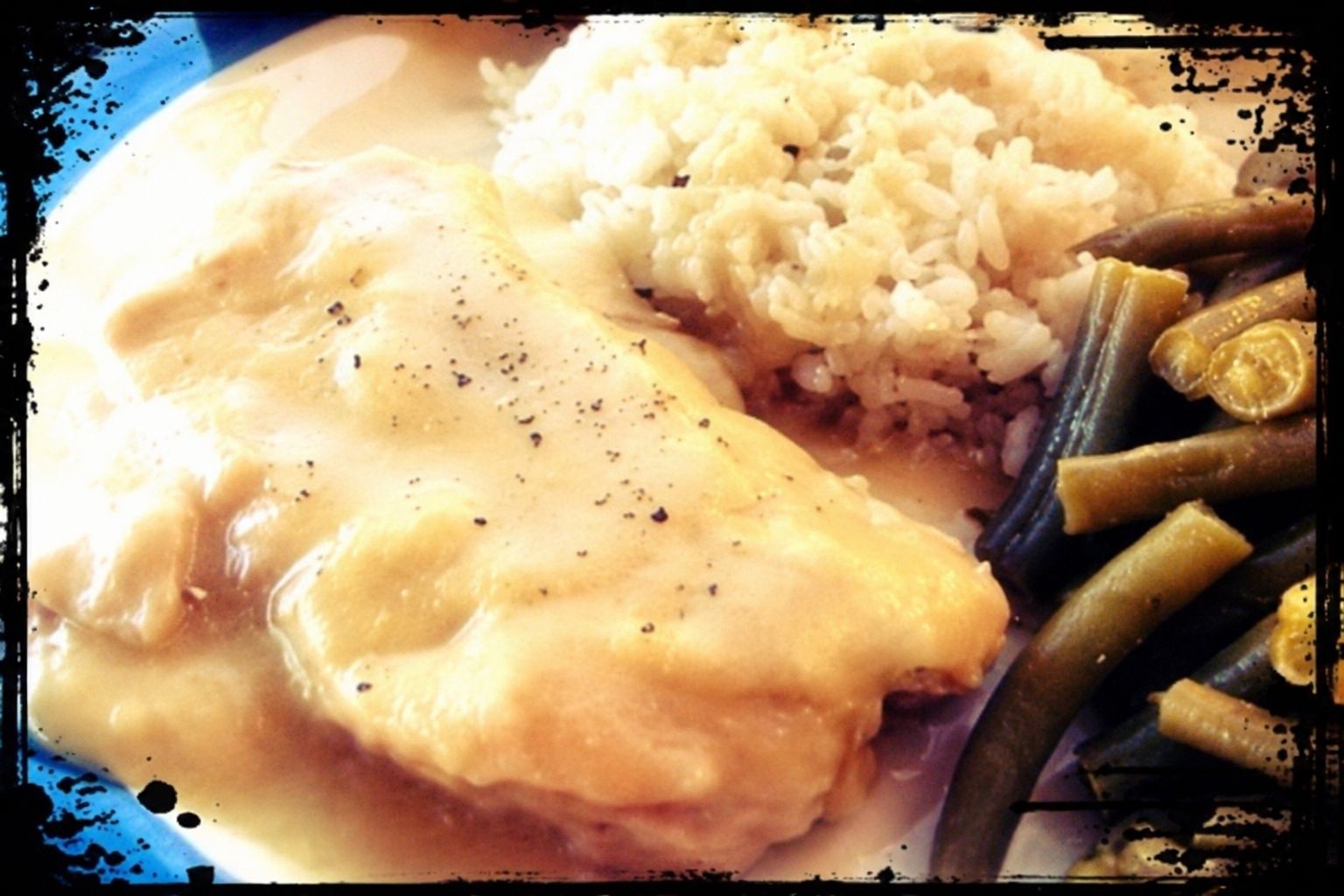 Browned pork chops covered with thick homestyle gravy