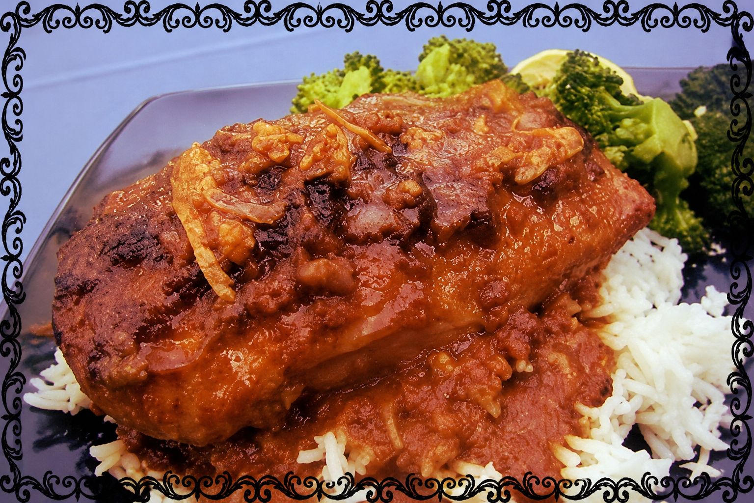 Creamy peanut chicken served with rice and sauce