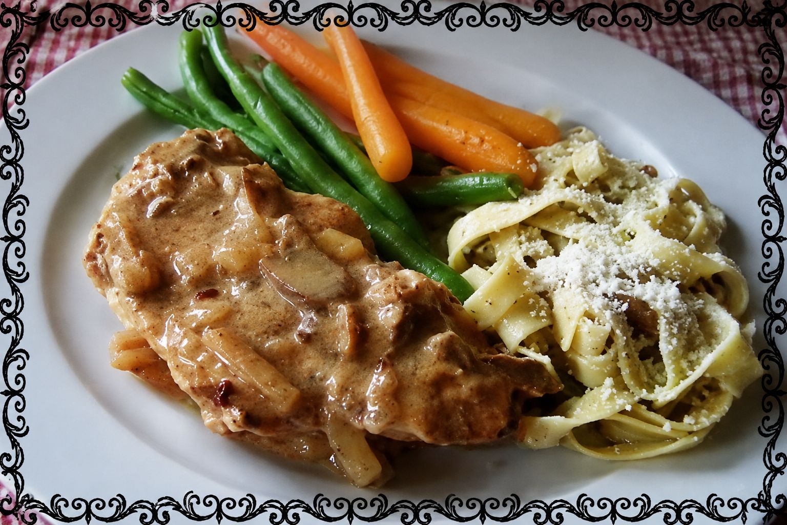 Tender pork chops with mushrooms and creamy onion gravy