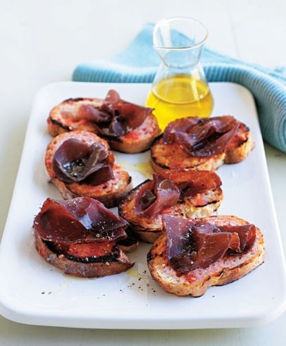 bresaola bruschetta with tomato garlic oil and pepper