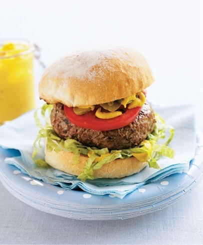 classic grilled hamburgers with lettuce tomato and pickles