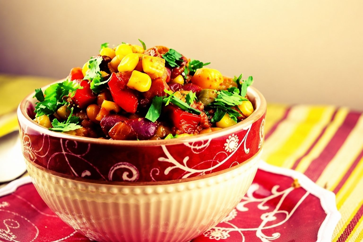 Vegetarian chili packed with beans corn and zucchini