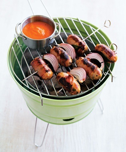 pancetta wrapped sausages with onion and red pepper sauce