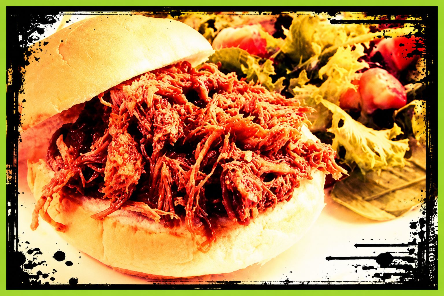 Shredded pulled pork with barbecue sauce on a bun