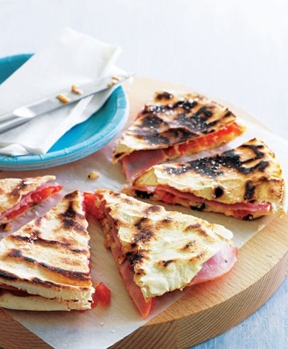 grilled spinach cheese quesadillas cut into warm wedges