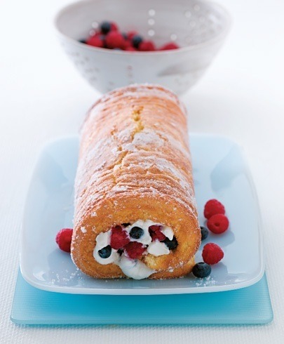 summer berry roulade filled with cream and berries