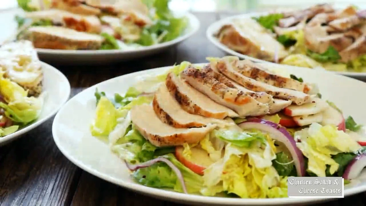 Apple grilled chicken salad plated with cheddar toast