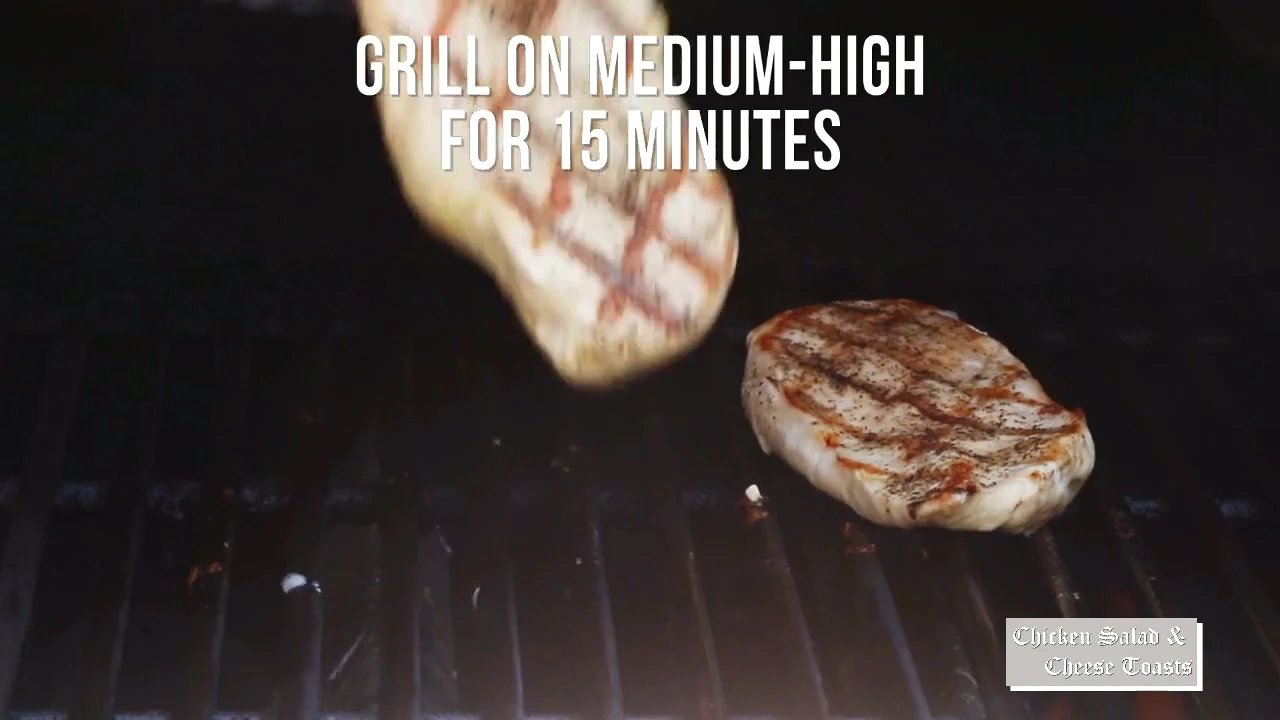 Chicken breasts grilling over medium high heat