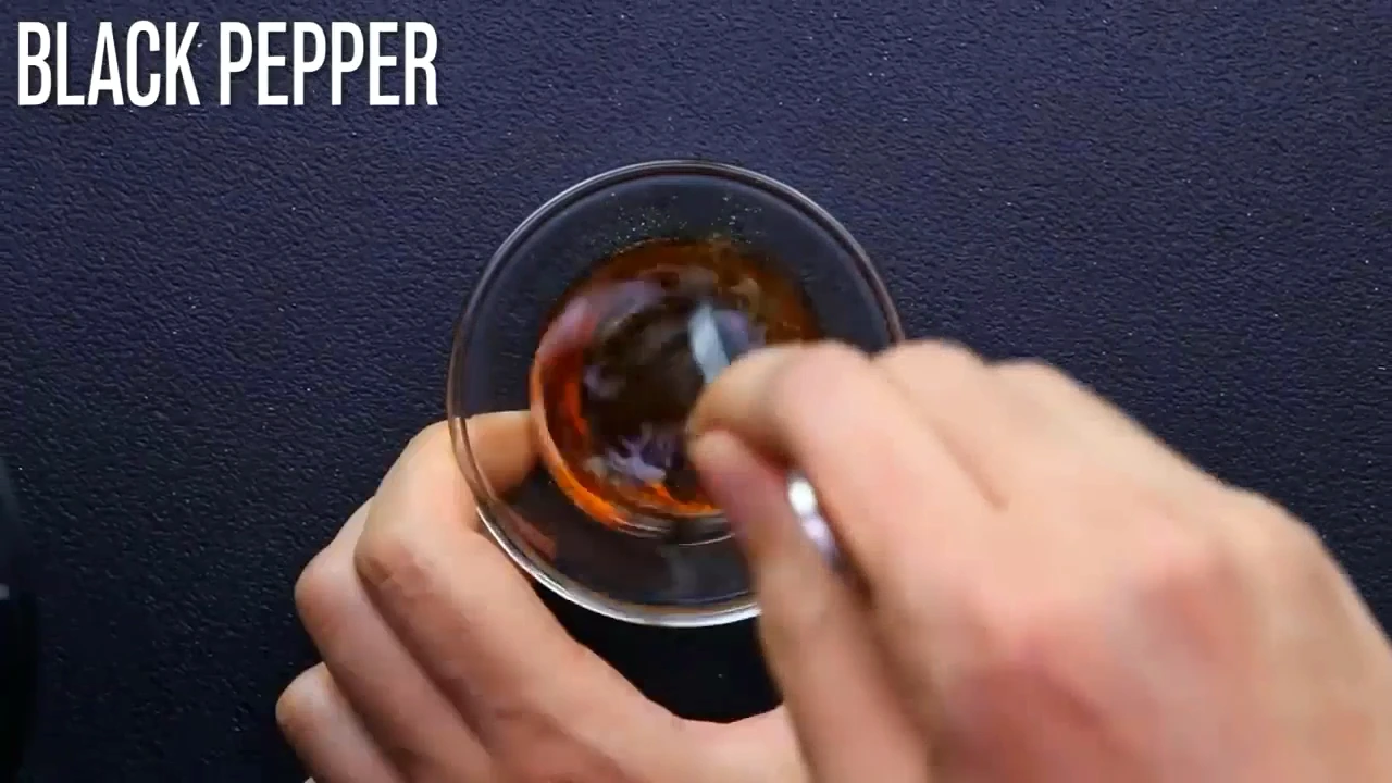 Stirring the sweet soy dressing for chicken lettuce salad.