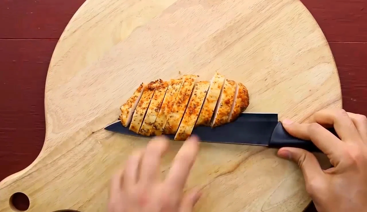 Slicing baked chicken breast