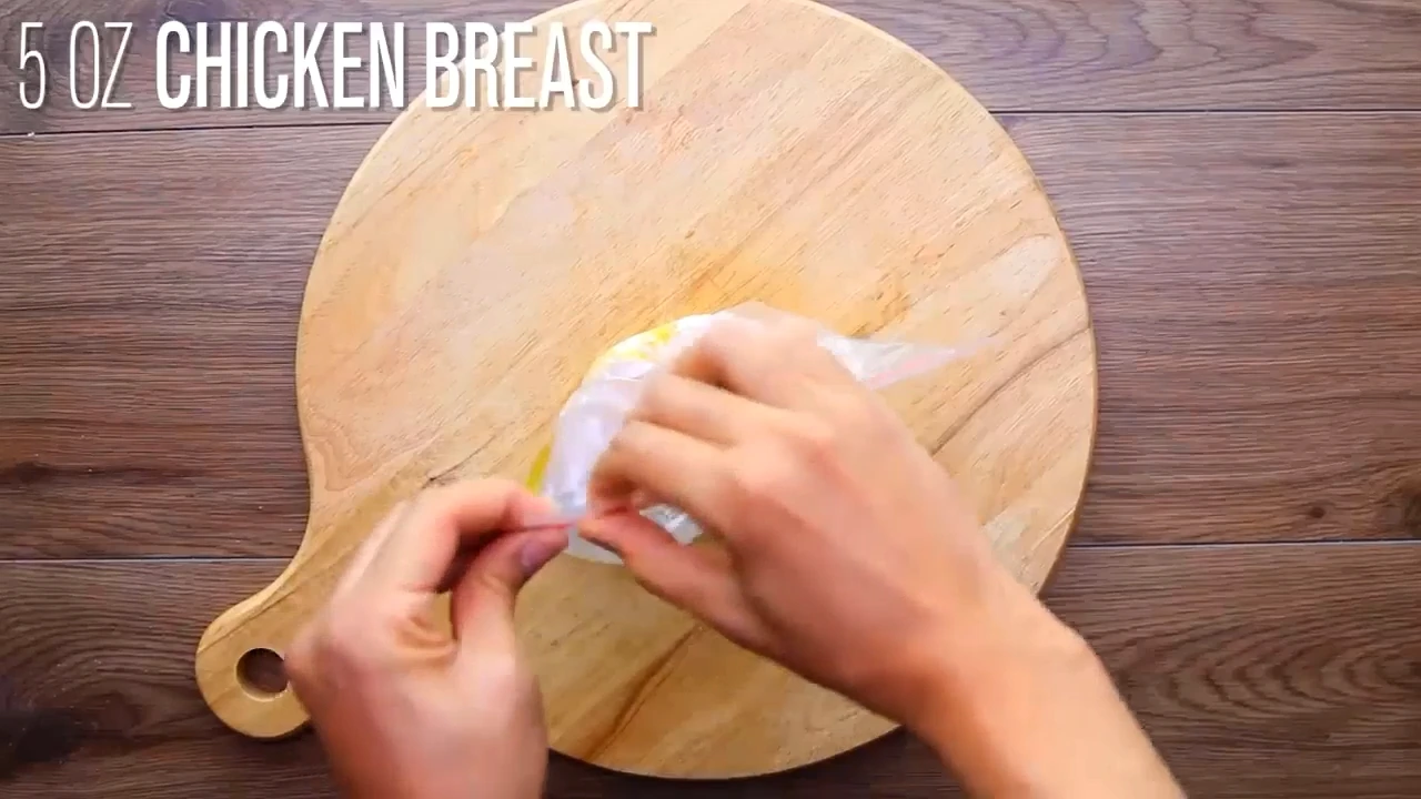 Chicken breast sitting in a quick yogurt marinade