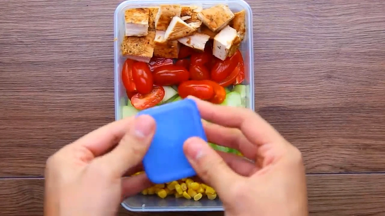 Finished meal prep chicken salad packed in a container