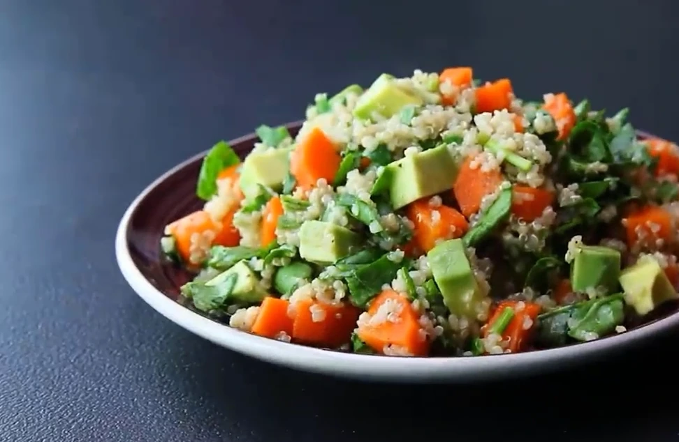 Finished quinoa salad on a plate.