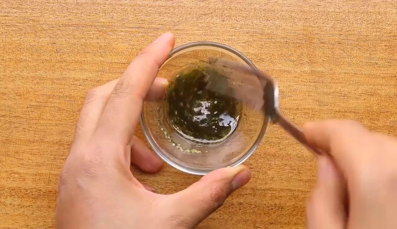 Whisking herb dressing for spinach pasta salad