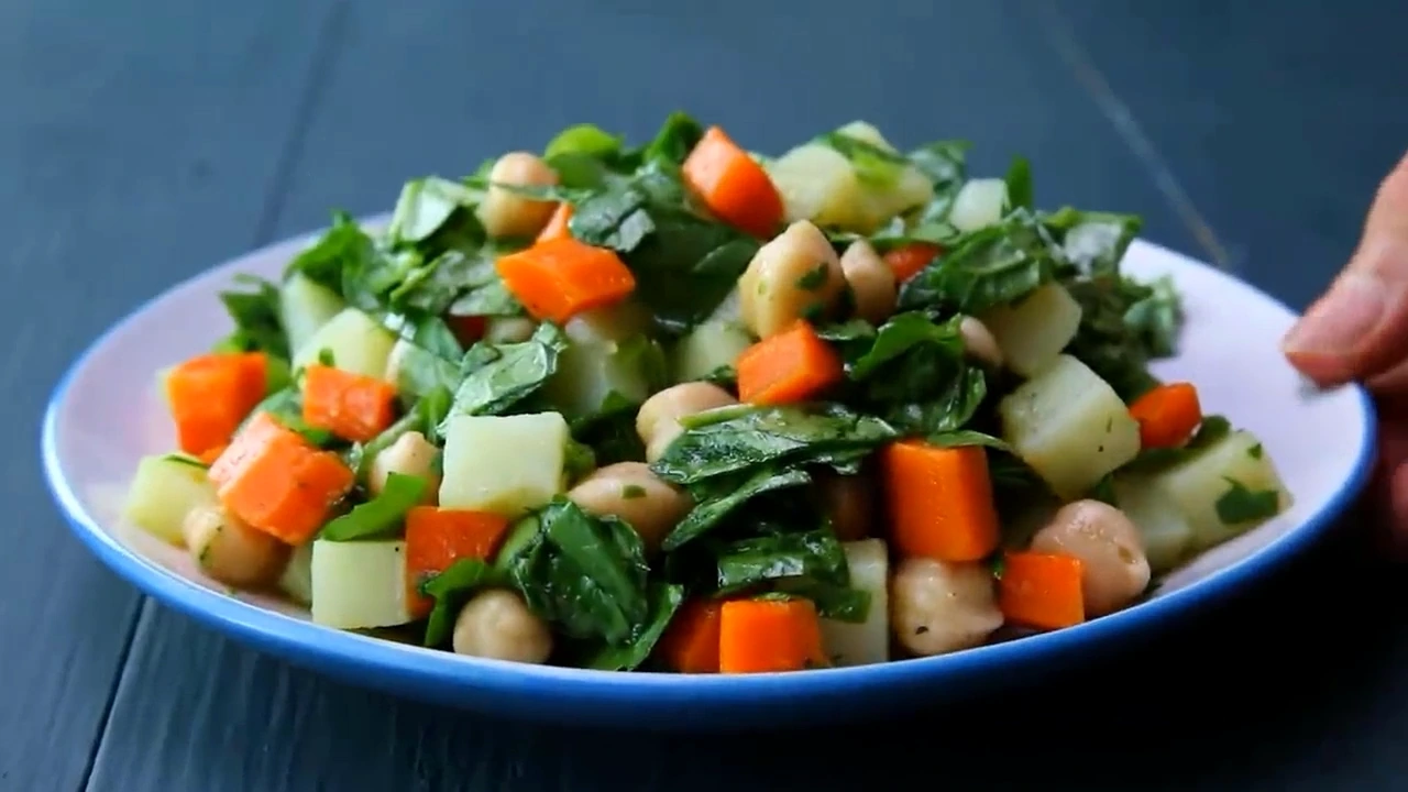 Finished spinach potato salad plated and ready to serve.