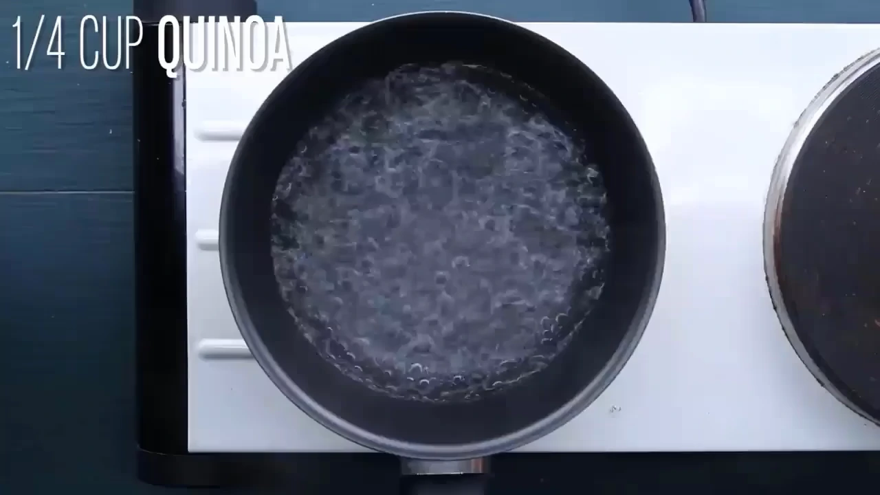 Adding quinoa to a pan.