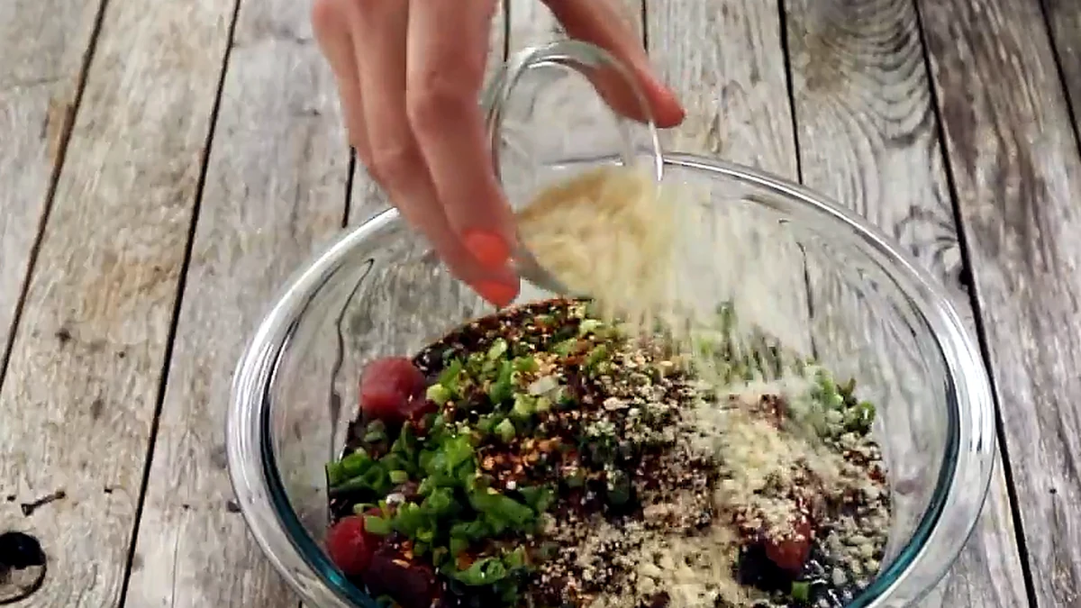 finely chopped macadamia nuts sprinkled over ahi poke
