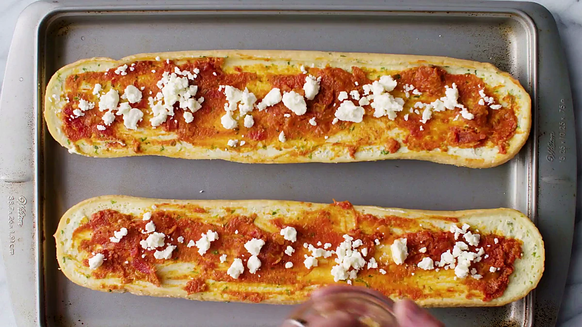 Feta added to tomato bread