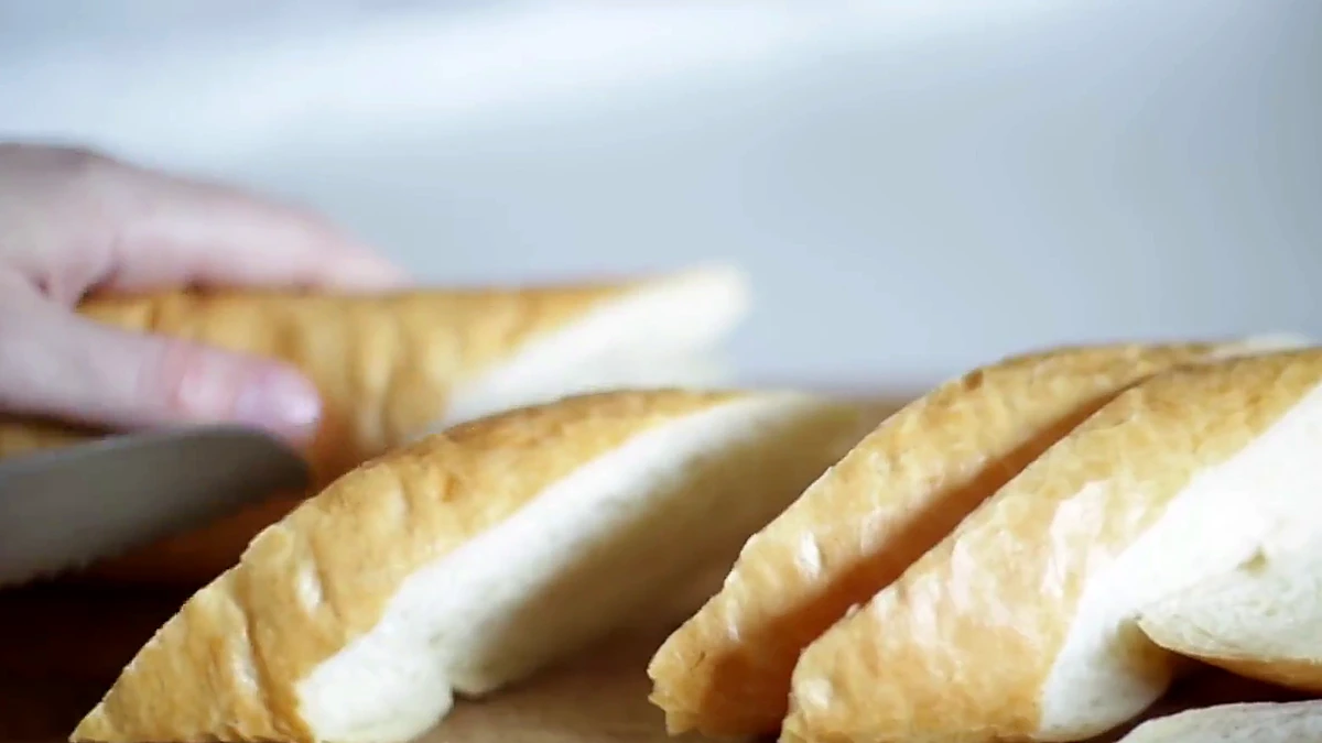 Baguette slices cut on a board