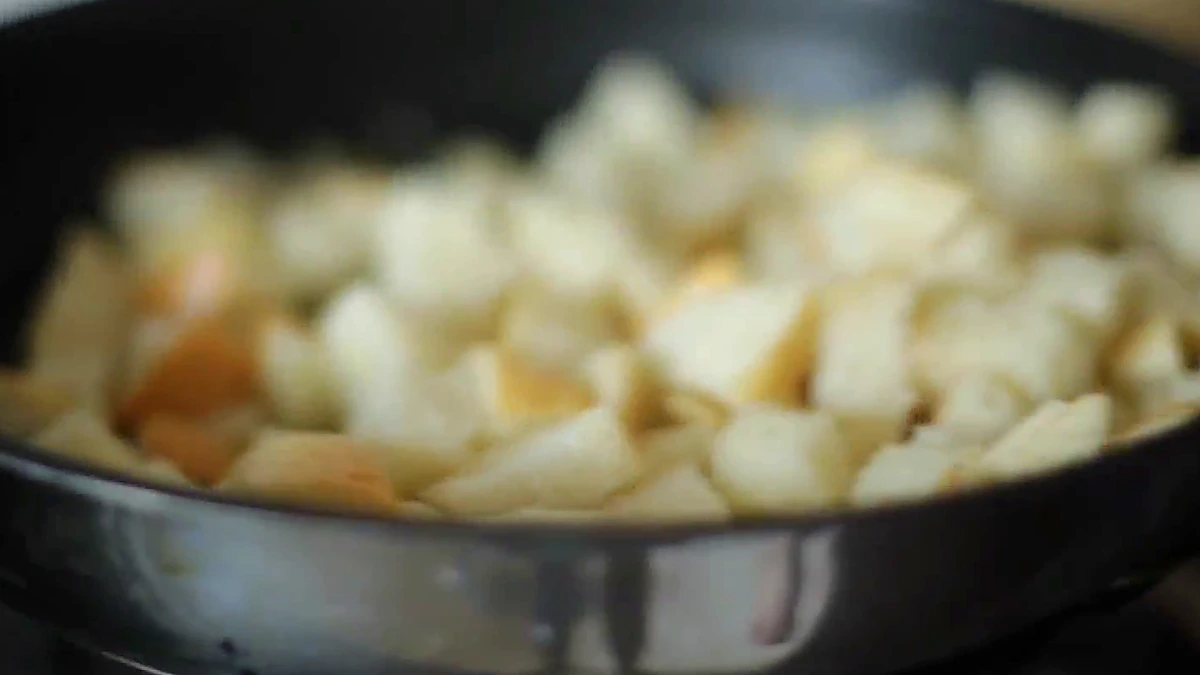 Golden croutons in the pan