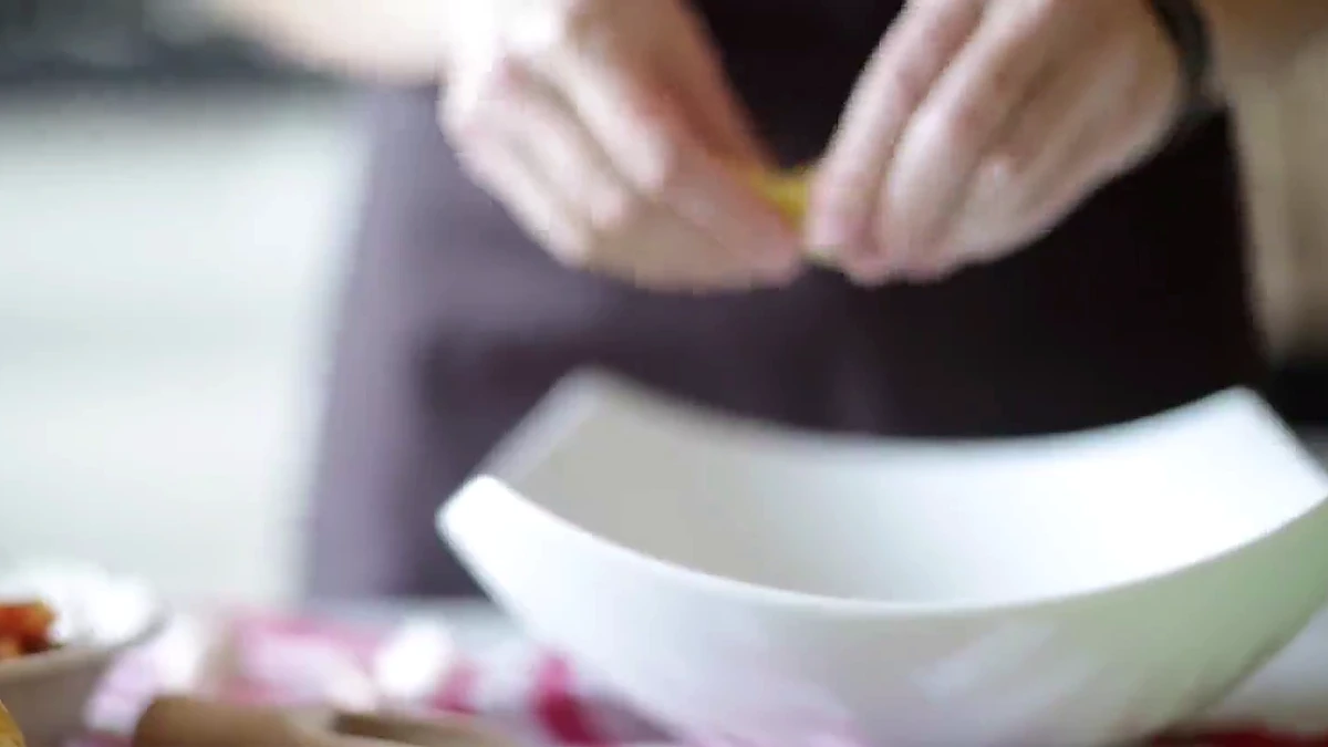 Romaine torn into a serving bowl