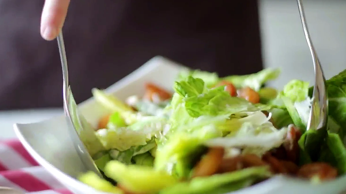 Shrimp Caesar salad tossed with dressing