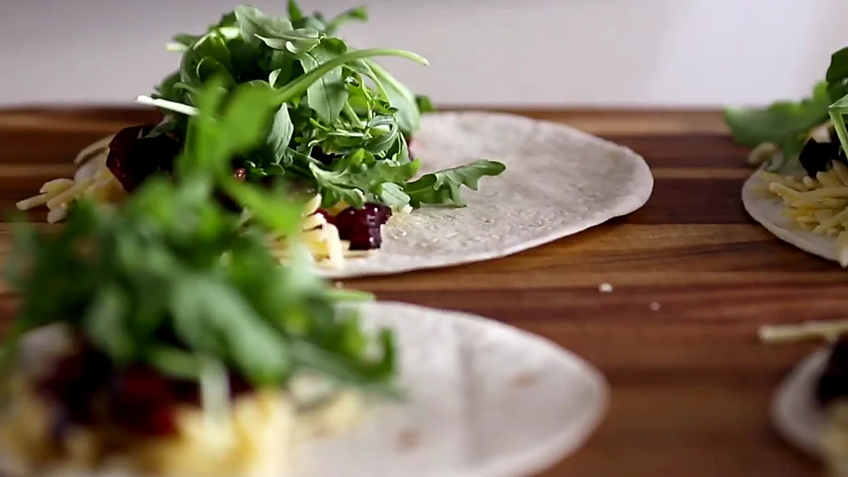 Cherries and arugula added to quesadillas