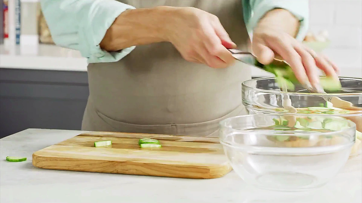 Cucumber added to cubed cantaloupe