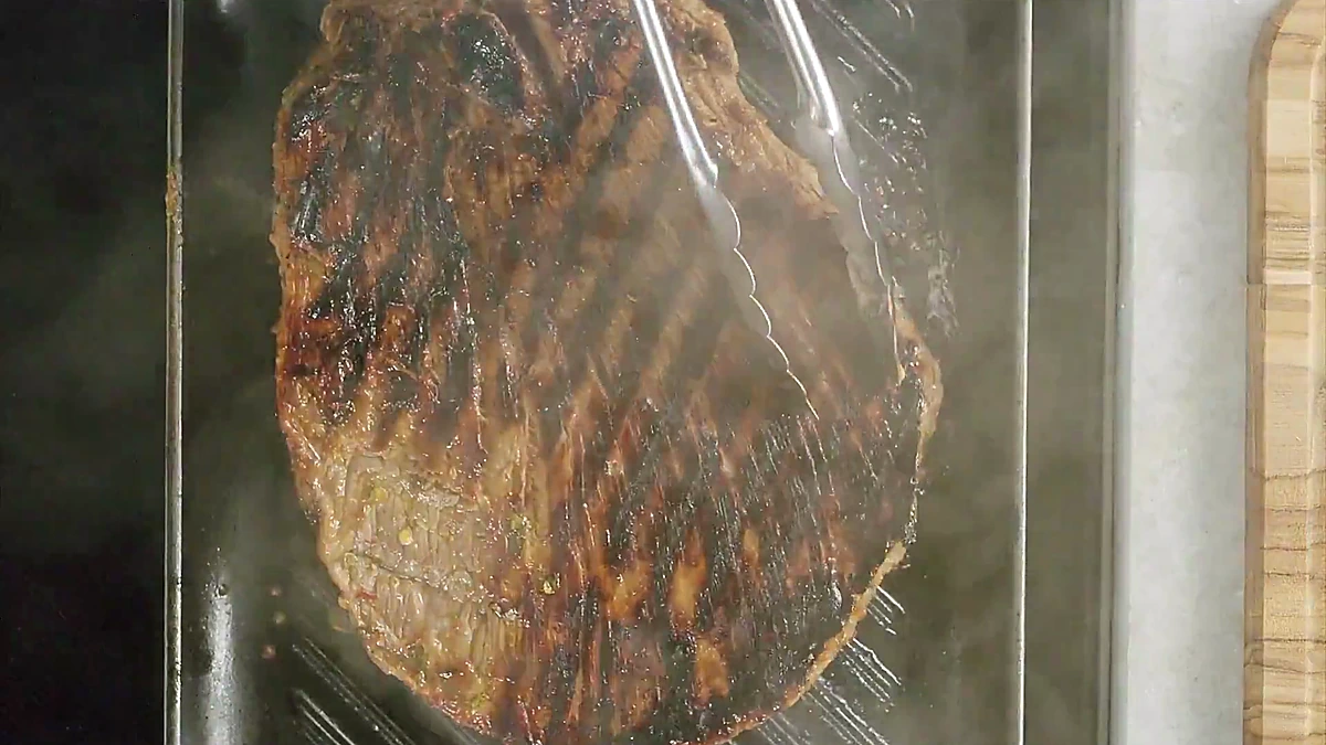 Chili herb flank steak with grill marks