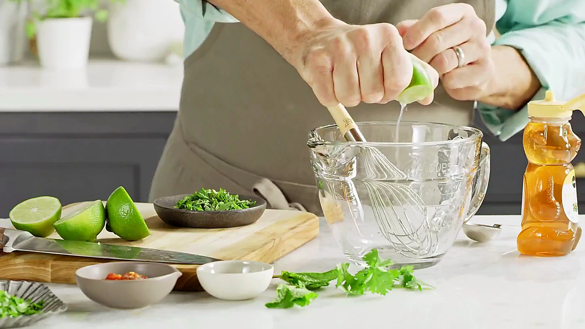 Fresh lime juice squeezed into a bowl
