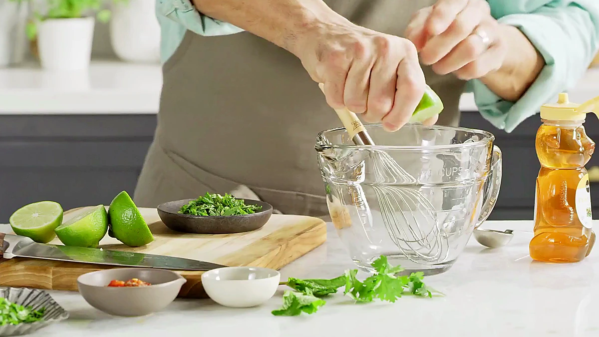 Limes, herbs, chili garlic sauce, and honey for chili herb steak