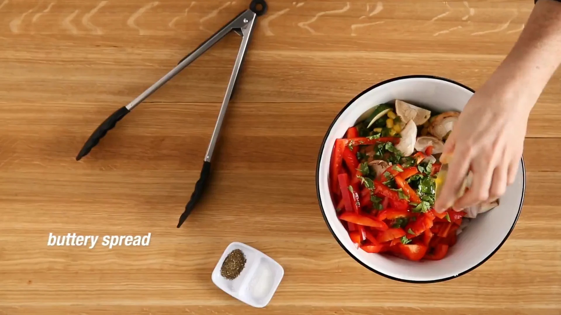 Buttery spread added to the seasoned veg bowl