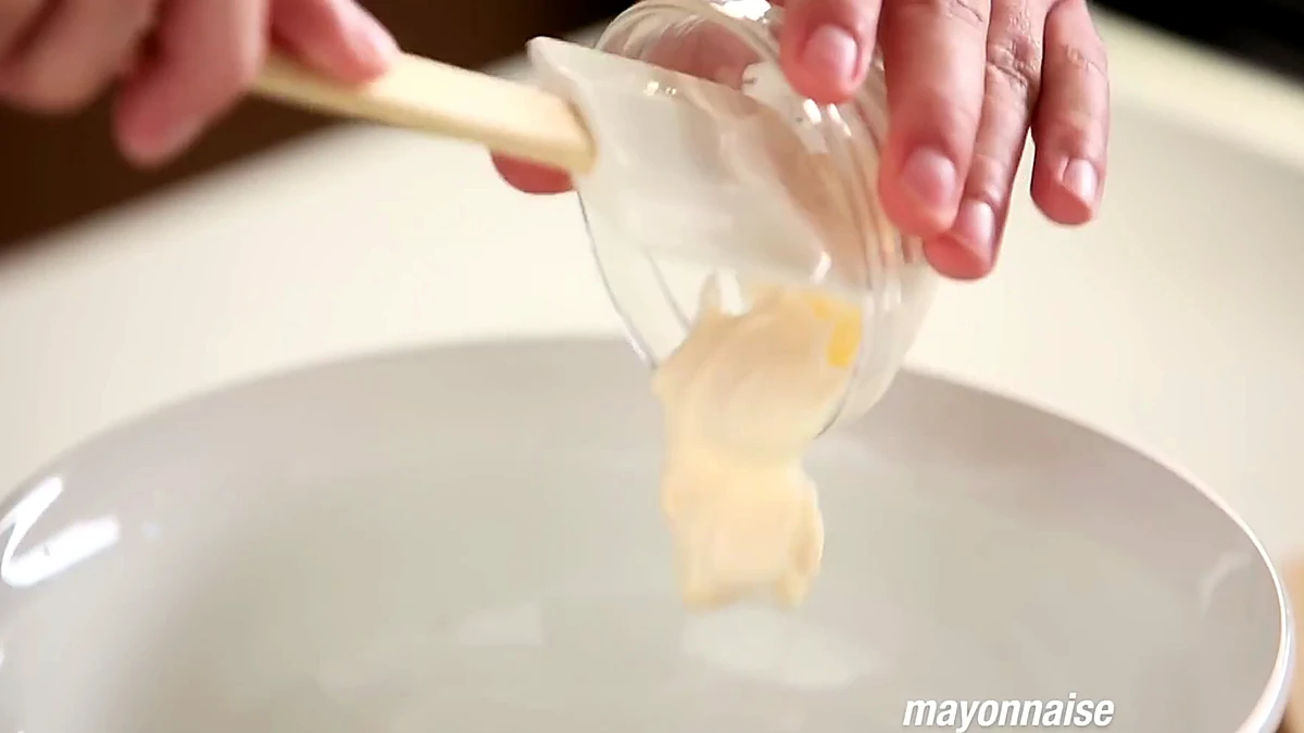 Mayonnaise added to the lime and cilantro mixture