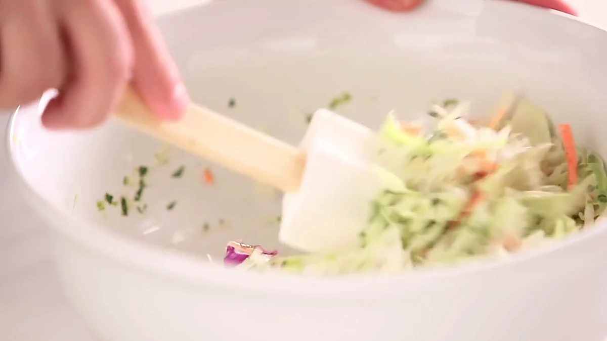 Cabbage slaw folded with lime dressing