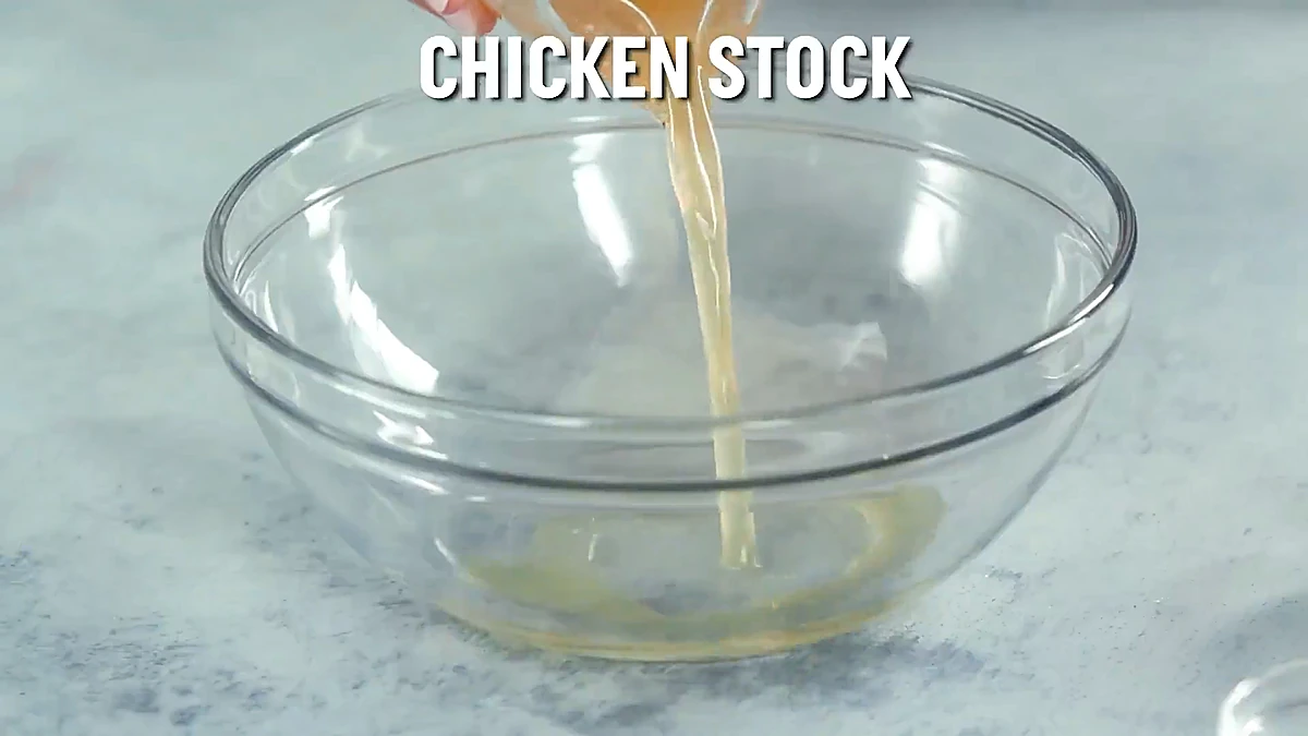 Chicken stock poured into a bowl