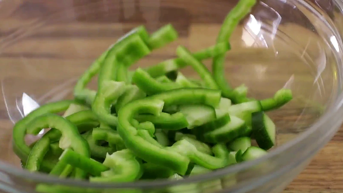 Green pepper strips added to the cucumber