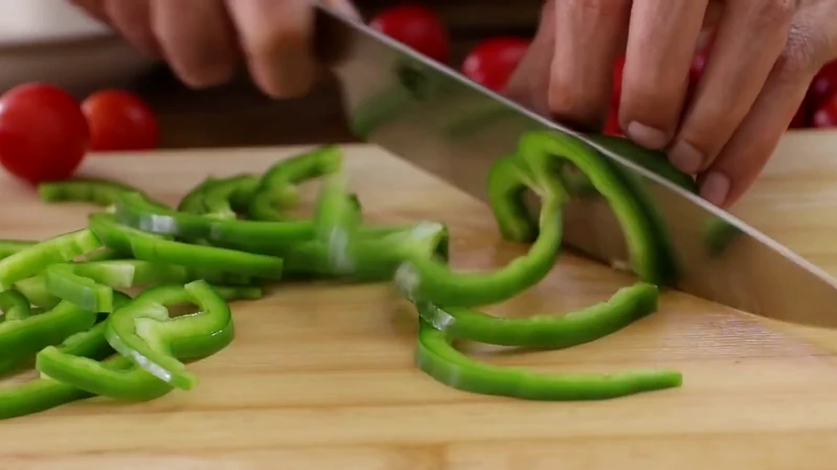 Green bell pepper sliced into strips