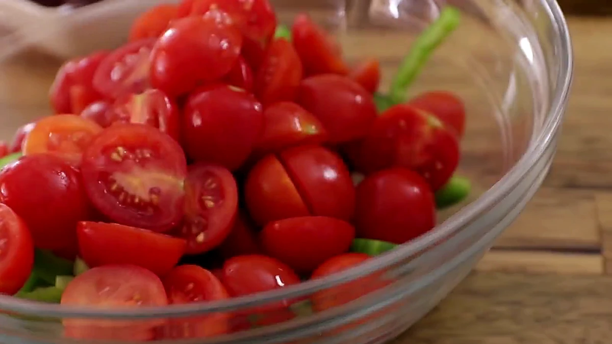 Cherry tomatoes added to the cucumber and pepper
