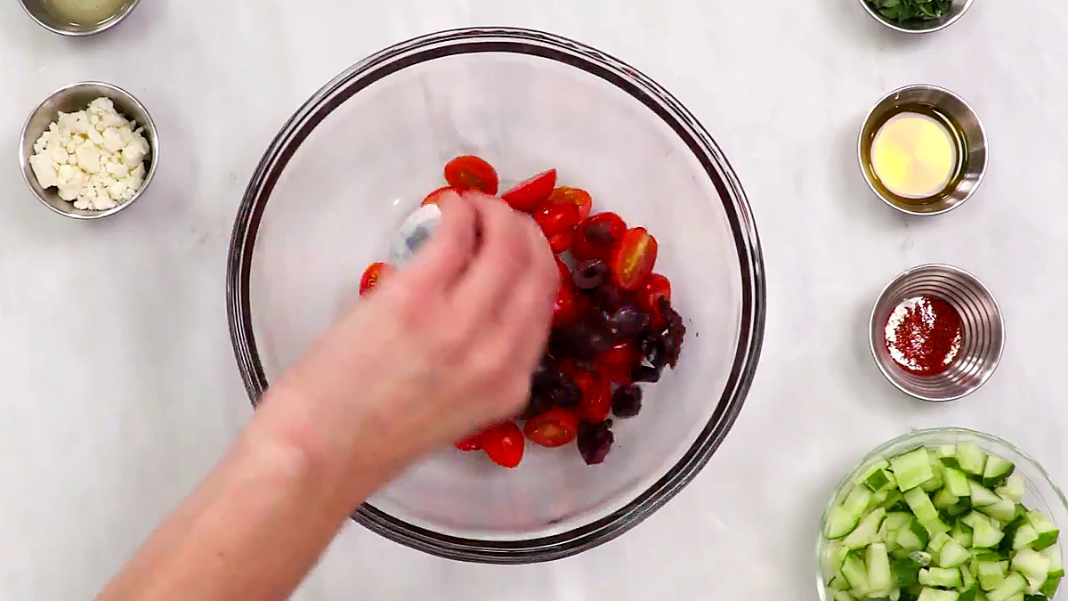 Kalamata olives added to the tomatoes