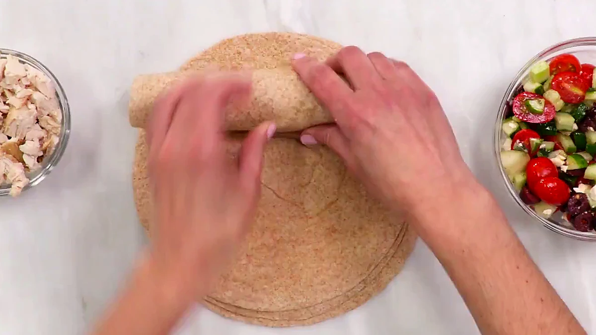 Greek chicken wrap rolled tight