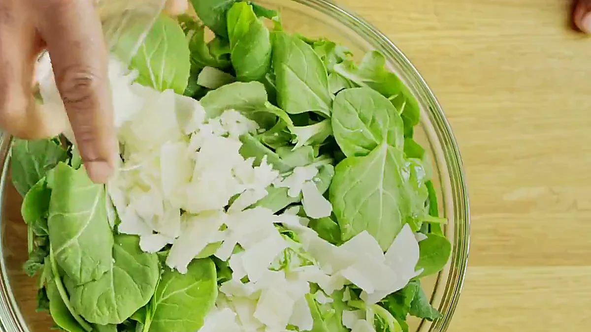 Baby kale salad blend with shaved Parmesan
