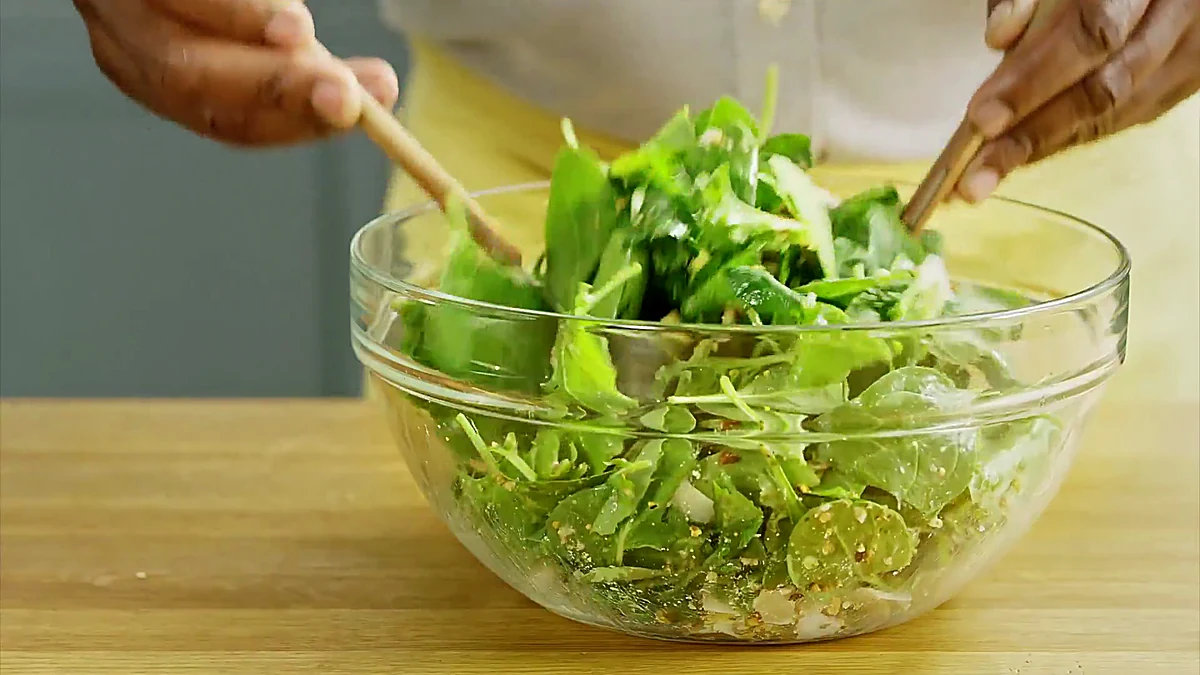 Kale pistachio salad tossed for grilled shrimp