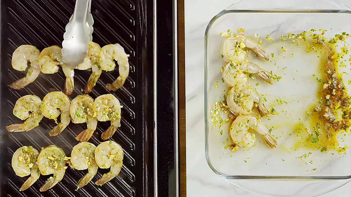 Shrimp skewers cooking on a grill pan