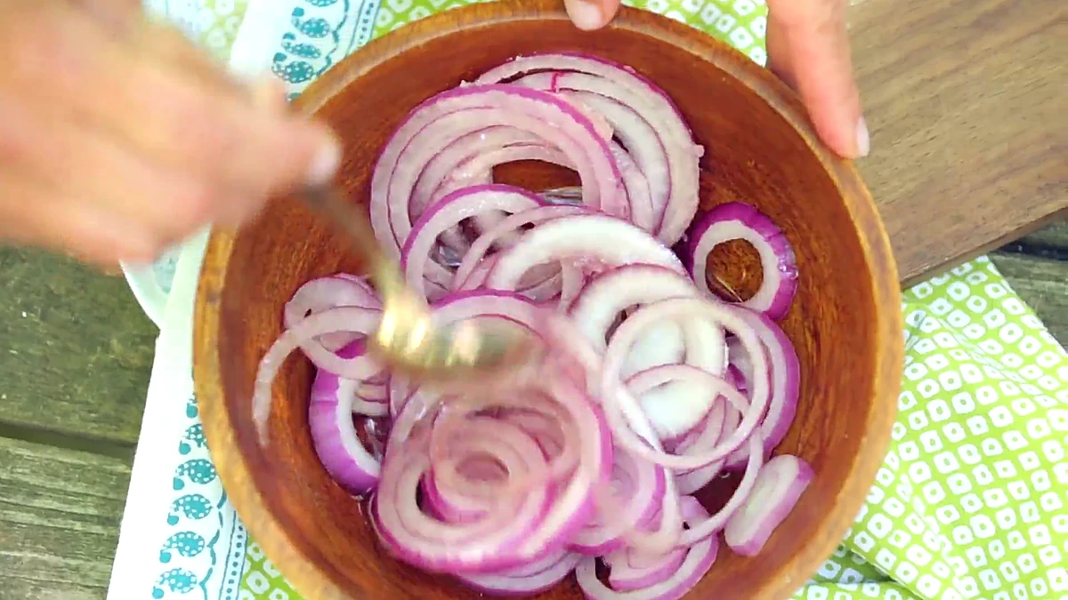 Red onion tossed in vinegar brine
