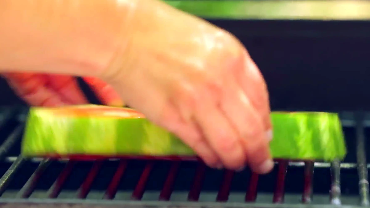 Watermelon round placed on the grill