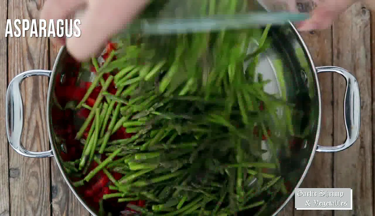 Asparagus added over red peppers